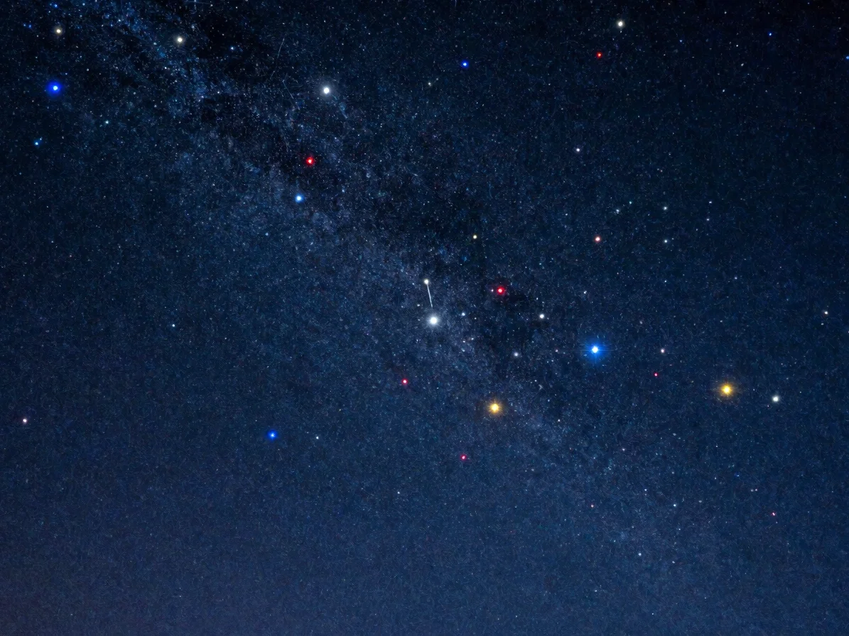 Vivid star field showing stars of different colors, red, white, a