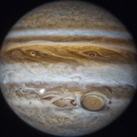 Astronomy photograph of Jupiter with its Galilean moons visible through a small telescope, natural night-sky darkness, n
